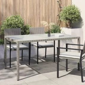   Szürke polyrattan és edzett üveg kerti asztal 150 x 90 x 75 cm