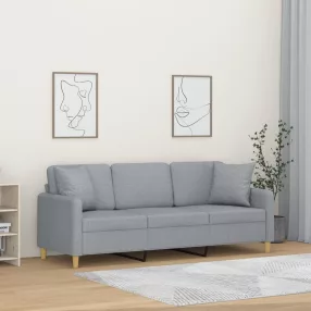   3 személyes világosszürke szövet kanapé díszpárnákkal 180 cm