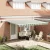 vidaXL Behúzható napellenző Zöld és Fehér 450 × 300 cm Szövet és Acél