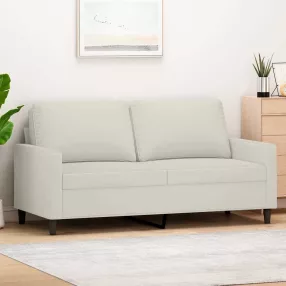 Kétszemélyes krémszínű bársony kanapé 140 cm