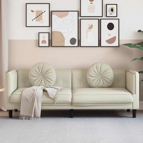 krémszínű bársony 3 személyes kanapé párnákkal