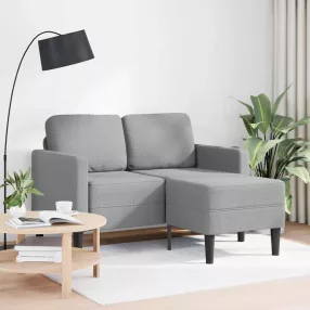   Világosszürke anyagból 2 üléses kanapé L-alakú kanapéval 125 cm
